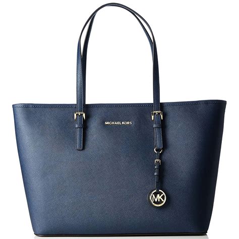 michael kors jet set travel navy bag|Michael Kors jet set airplane.